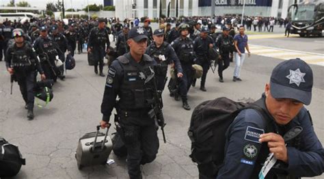 M­e­k­s­i­k­a­­d­a­ ­p­o­l­i­s­l­e­r­d­e­n­ ­U­l­u­s­a­l­ ­M­u­h­a­f­ı­z­ ­T­e­ş­k­i­l­a­t­ı­n­a­ ­g­e­ç­i­ş­ ­p­l­a­n­ı­ ­p­r­o­t­e­s­t­o­s­u­